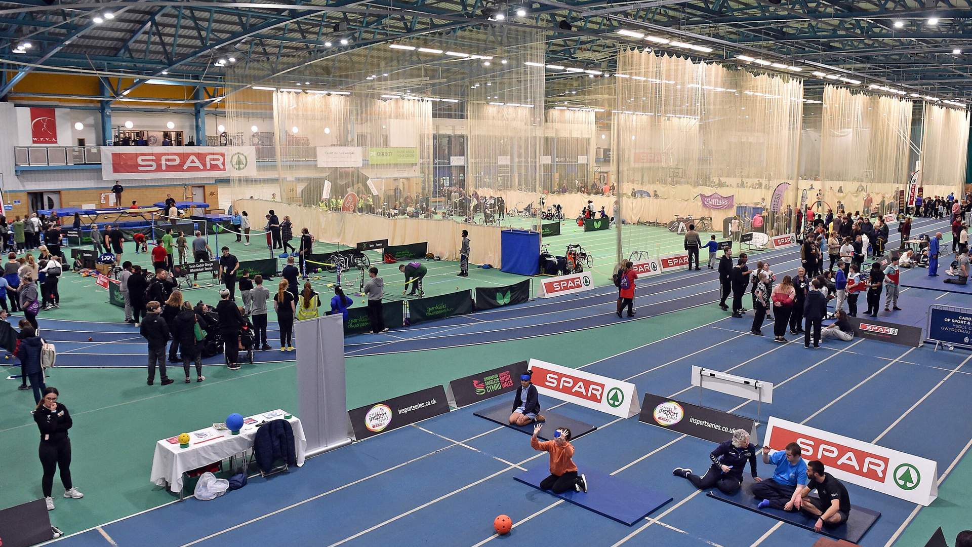 A busy National Indoor Athletics Centre filled with school age children competing in various sports
