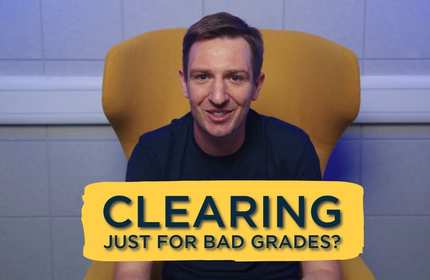 A man sits on a yellow chair with the text 'is clearing just for bad grades?' in front of them